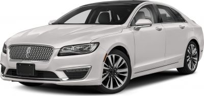 Prominent grille and sleek LED headlights on a modern luxury sedan