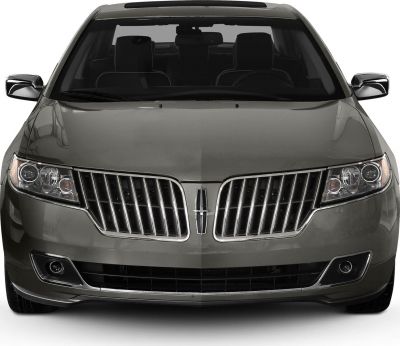 Front split grille with vertical slats and dual headlights