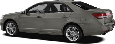 Side view of sedan with chrome alloy wheels and sleek design
