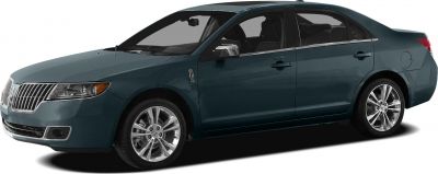 Side profile of luxury sedan with chrome grille and alloy wheels