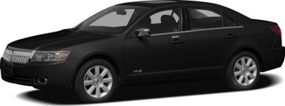 Side profile of black mid-2000s luxury sedan with alloy wheels