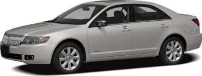 Silver sedan with prominent grille and alloy wheels shown from front side