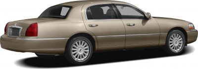 Side and rear profile of a four-door luxury sedan with distinctive tail lights and alloy wheels