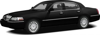 Black luxury sedan with chrome trim and multi-spoke wheels side-front view