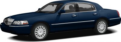 Side profile of a luxury sedan with chrome trim and distinct wheel design.