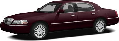 Luxury sedan side profile with chrome trim and classic design.