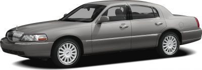 Silver luxury sedan with front grille and alloy wheels