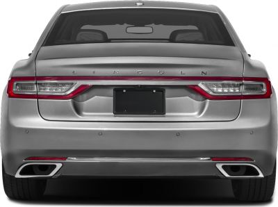 Distinctive rear taillights, twin exhaust outlets, and rear bumper sensors