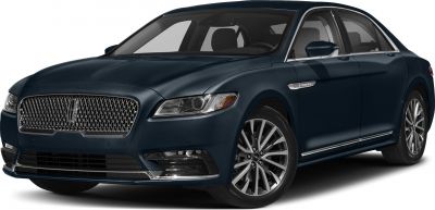 Luxury sedan with mesh front grille and multi-spoke alloy wheels