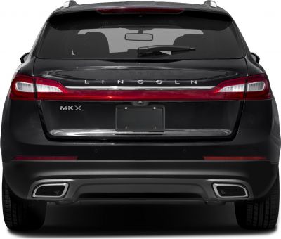 Rear view with continuous LED tail light and dual exhaust outlets
