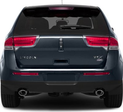 Rear view with dual exhausts, distinctive taillights, AWD badge, rear windshield wiper