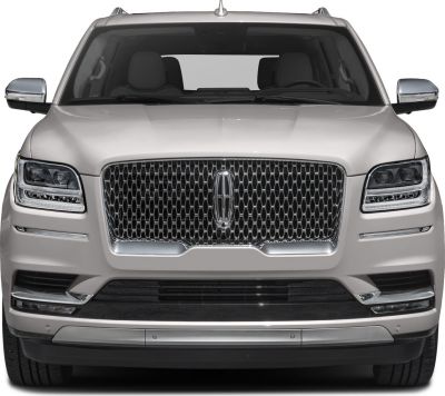 Front view with prominent grille and LED headlights