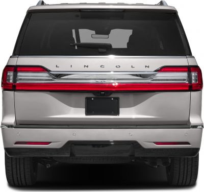 Rear view of luxury SUV with distinctive tail lights and badge