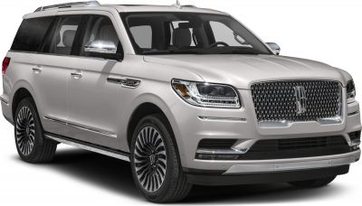 Front side view of luxury SUV with distinctive grille and headlights