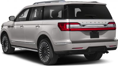Luxury full-size SUV rear with LED tail lights and chrome trim