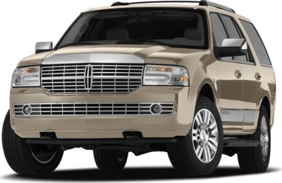 Luxury SUV front view with chrome grille and alloy wheels