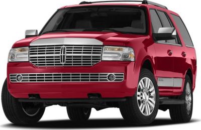 Front view of red luxury SUV with prominent grille and headlights