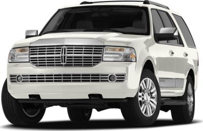 Front exterior view featuring grille and headlights of a large luxury SUV