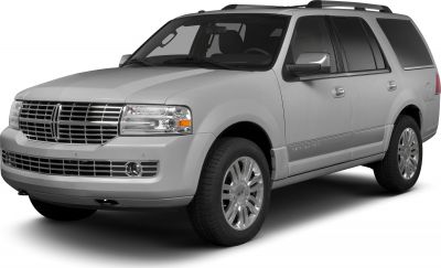Silver luxury SUV with chrome grille and alloy wheels