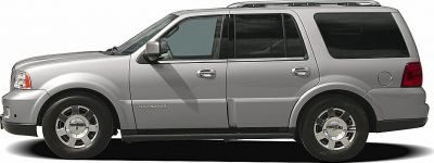 Side profile of a large luxury SUV with chrome wheels and tinted rear windows.