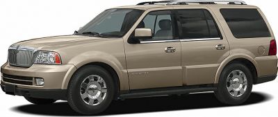 Side view of 2003 full-size SUV with chrome grille and roof rails