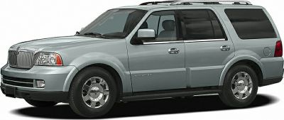 Side profile view of full-size SUV with roof rails and chrome wheels.