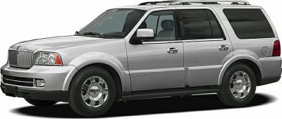 Silver full-size SUV side profile with distinct body and wheel design