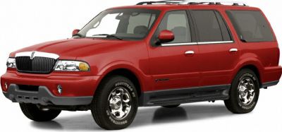 Red SUV front side view with grille and roof rails