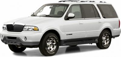 White SUV with front grille and side profile
