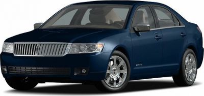 Front grille and headlights of a blue sedan