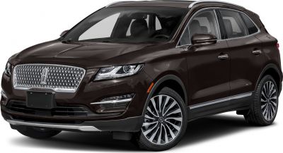 Distinctive front grille and multi-spoke alloy wheels on a dark brown SUV