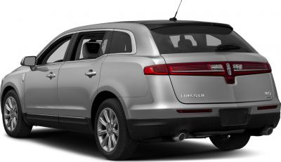 Rear view of SUV with interconnected tail lights and dual exhausts
