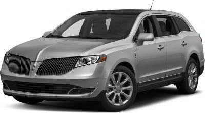 Front side view of a luxury SUV with distinctive grille and headlight design