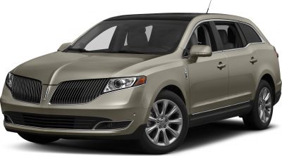 Front-side view of luxury SUV with vertical-slat grille and sleek headlights