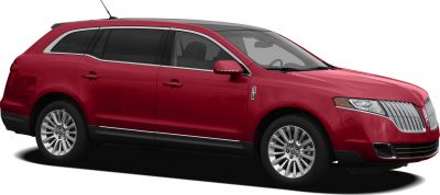 Red luxury crossover SUV with chrome grille and alloy wheels side view