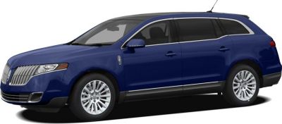 Full-size luxury SUV side profile with alloy wheels and prominent grille