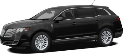 Black luxury SUV with chrome grille and spacious design