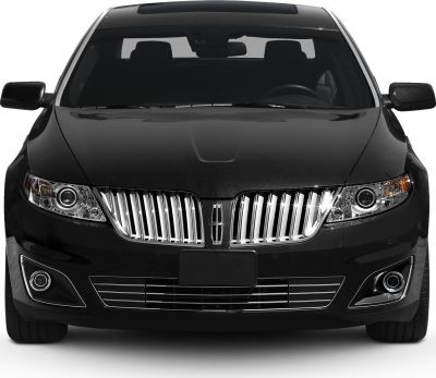 Front view with split vertical chrome grille and dual headlight clusters
