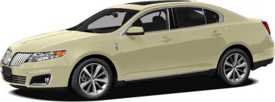 Front side view of a beige mid-size sedan with alloy wheels