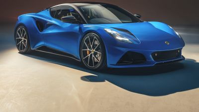 Sleek blue sports coupe with aerodynamic body and alloy wheels