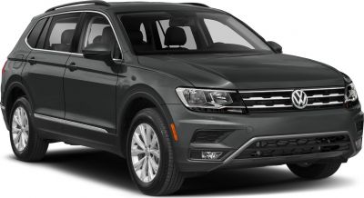Dark gray SUV front side view with headlights and grille