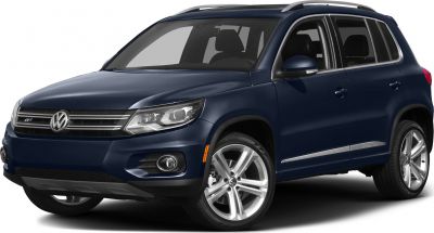 Front-side view of blue SUV with headlights and alloy wheels