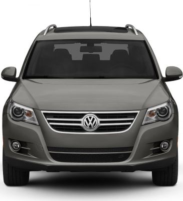 Front view with grille, headlights, and roof rails