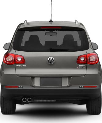 Rear view of SUV with dual exhaust, roof rails, and tail lights
