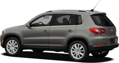 Side view of mid-size SUV with alloy wheels and tinted windows
