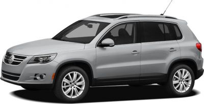 Side profile of silver compact SUV with alloy wheels and roof rails