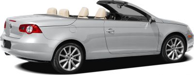 Side view of convertible with beige seats and alloy wheels