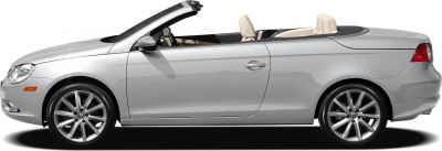 Side view of 2006 convertible with retractable hardtop and alloy wheels