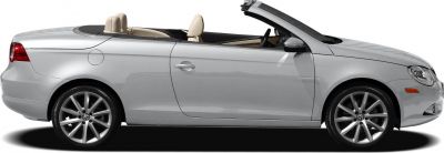 Silver silver convertible coupe side profile with beige seats and alloy wheels