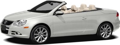 White convertible with beige leather interior and alloy wheels